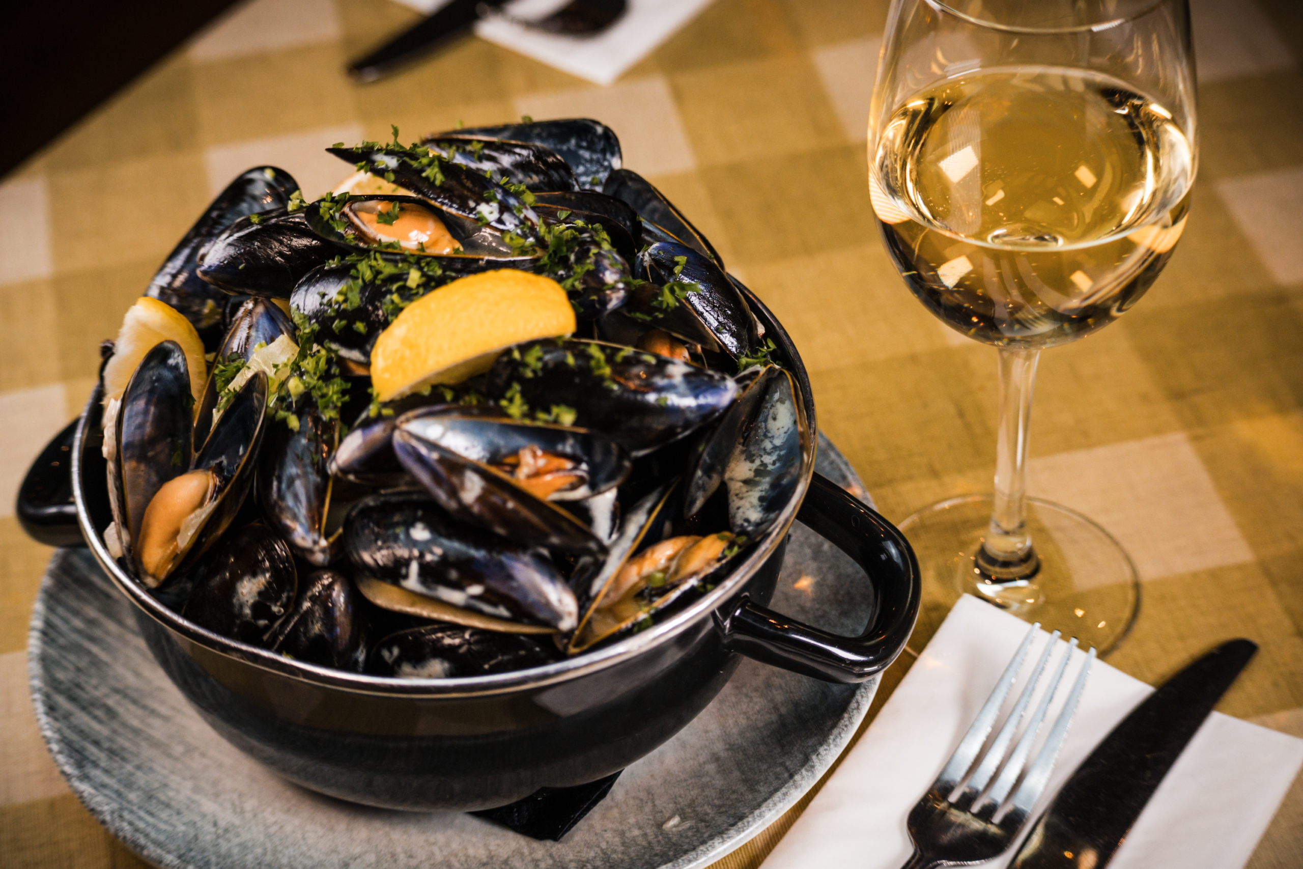 Moules marinière on the table at La Petite Colline