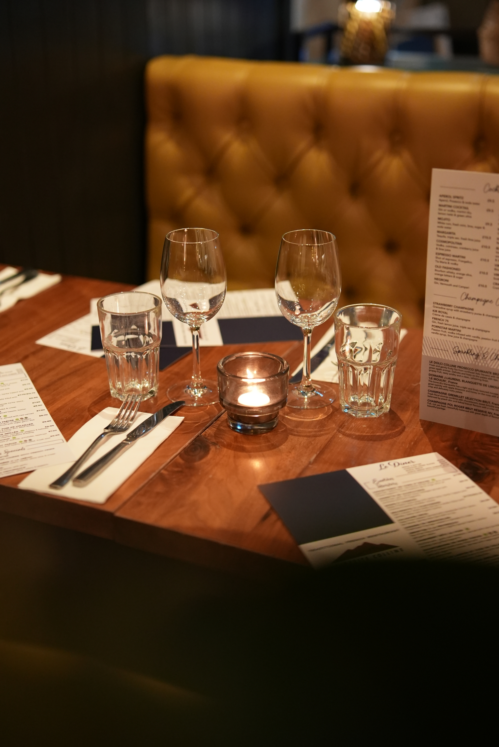 A candlelit table at La Petite Colline