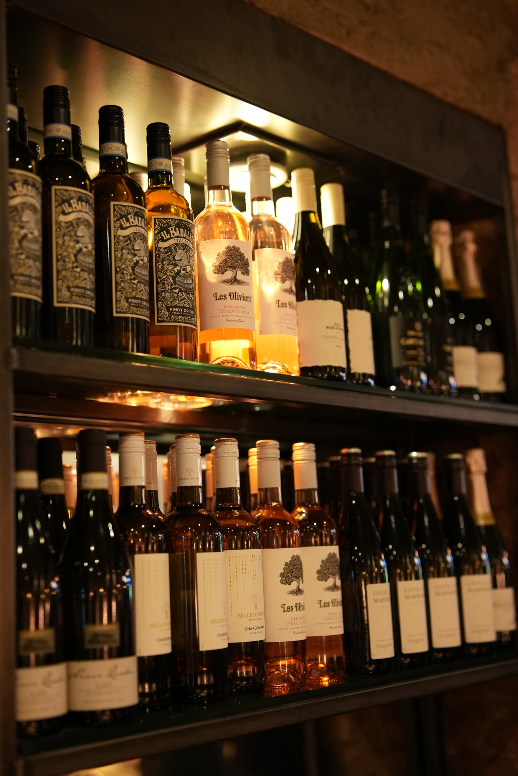 Wine shelves at La Petite Colline